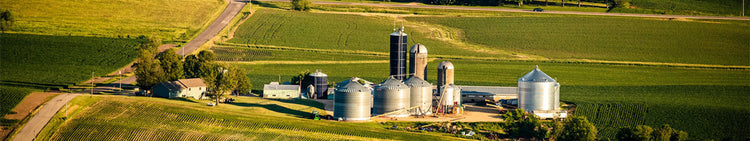 Aerial View of Farm with Grain Storage Silos